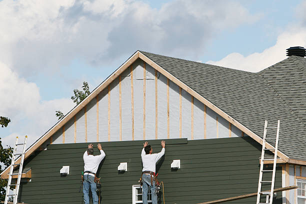 Professional Emergency Siding Repair technician working in Williamsfield, OH